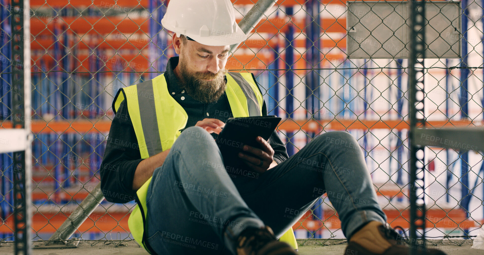 Buy stock photo Planning, storage and tablet with construction worker man in warehouse for research or update. App, checklist and safety with person on floor for maintenance, management or manufacturing of depot