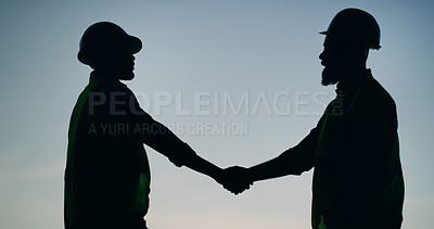 Buy stock photo Silhouette, handshake and men in outdoor with hard hats, partnership or agreement for project plan. Team, shaking hands and construction at sunset with ppe, staff and negotiation in contractor deal.