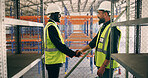 Smile, construction worker and men shaking hands in warehouse for storage deal, agreement or welcome. Team, architect and handshake for industrial collaboration, depot development or safety approval 