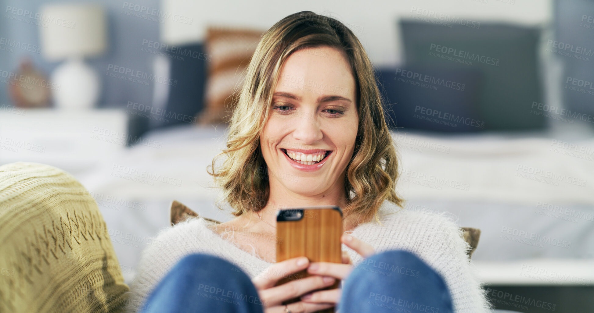 Buy stock photo Phone, happy and woman on sofa in home for networking, social media or contact on mobile app. Relax, technology and female person with cellphone for online communication in living room at house.