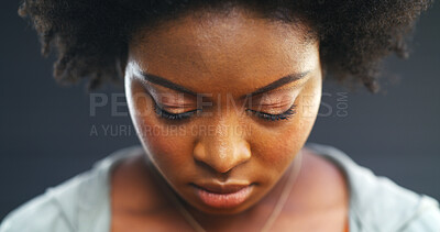Buy stock photo Sad, woman and think in studio, mental health and student with university debt and financial strain. Disappointed, black person with depression for study loan, reflection and scholarship rejection