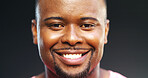 Beauty, face and portrait of black man in studio with satisfaction for cosmetics or dermatology. Skincare, smile and teeth of African model on dark background for cosmetology benefits or results