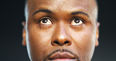 Buy stock photo Thinking face, black man and serious in studio with doubt, confused and contemplating decision. Curious, person and thoughtful on background with wondering, brainstorming and problem solving ideas
