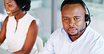 Businessman, consultant and call center team with headset in agency for online advice or help. Portrait, male person or African agent with mic for virtual assistance, tech support or network service
