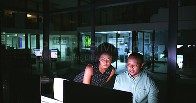 Buy stock photo Night, meeting and business people on computer in office for finance review, budget planning and report. Corporate, teamwork and man with woman on pc for working late, discussion or proposal feedback