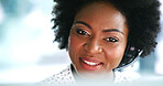 Happy, black woman and agent with headset for communication or online tech support in office. Female person, friendly or African consultant with smile or mic at call center for virtual assistance