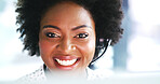 Happy, black woman and call center agent with headset for communication or online tech support. Female person, friendly or African consultant with smile or mic for web service or virtual assistance