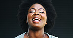 Black woman, portrait and laugh in studio for funny joke, crazy humor and comic on dark background. LOL, happy face and African person with smile, comedy or excited with goofy expression for euphoria