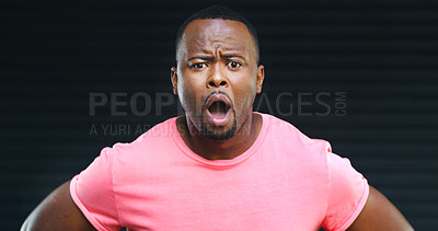 Buy stock photo Portrait, shock and African man in studio with dark background, intense and surprise at sale. Reaction, close up and male model on set with black backdrop, confusion and amazed at discount price.