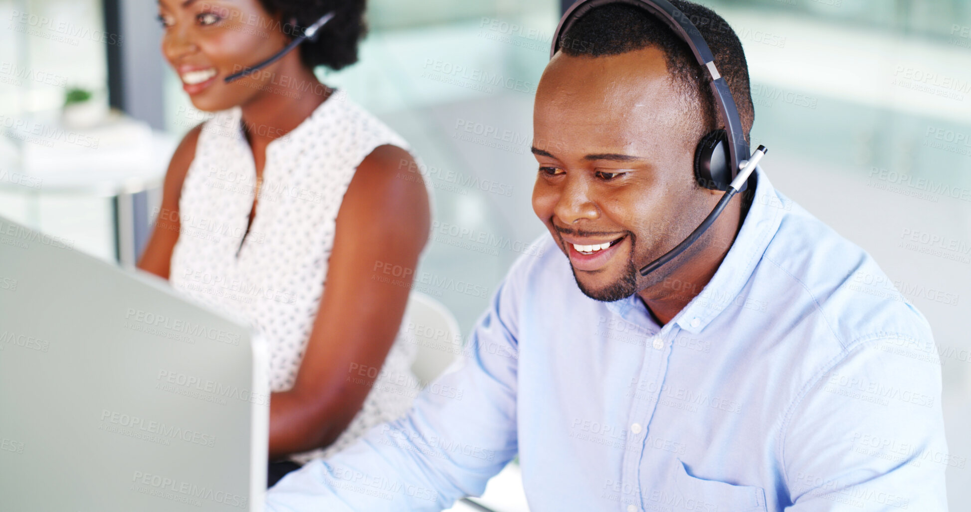 Buy stock photo Call center, business and happy black man with computer for quality assurance or coworking. Contact us, listen and agent with help for feedback, support or customer service with monitoring specialist