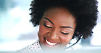Happy, black woman and consultant with headset for communication or online tech support. Female person, friendly and helpful agent with smile or mic at call center for virtual assistance in workplace