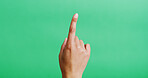 Hand, click and person in studio, green screen and swiping with dashboard on background. Closeup, mockup space or finger with personalized experience, invisible and interactive with virtual interface