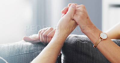 Buy stock photo Home, couple and holding hands with love, loyalty and connection with partner for commitment. Trust, care and people together for comfort, bonding and support in marriage for relationship in house