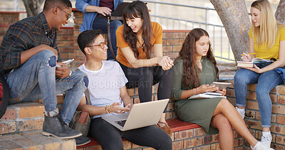 Buy stock photo Laughing, friends and students at campus, talk or conversation for exam results on laptop or online. Happy, people and discussion for scholarship opportunity, funny joke and break in university