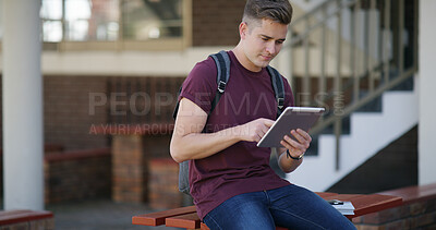 Buy stock photo Boy, student and research with tablet for network connection, study or online course on campus. Male person, academic learner and scrolling with technology for higher education, learning or app