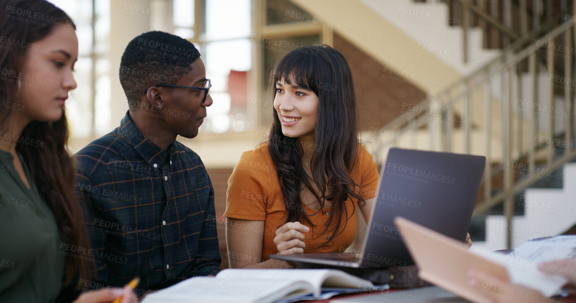 Buy stock photo Students, books and study group with laptop at university for exam preparation, assignment and help. Education, people and tech on campus for assessment discussion, tutorial research and scholarship