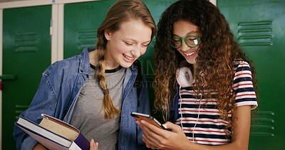 Buy stock photo Smile, friends and locker with phone at high school for education, gossip news and funny message. Happy, girl and students with mobile for learning, meme website and check test results for assessment