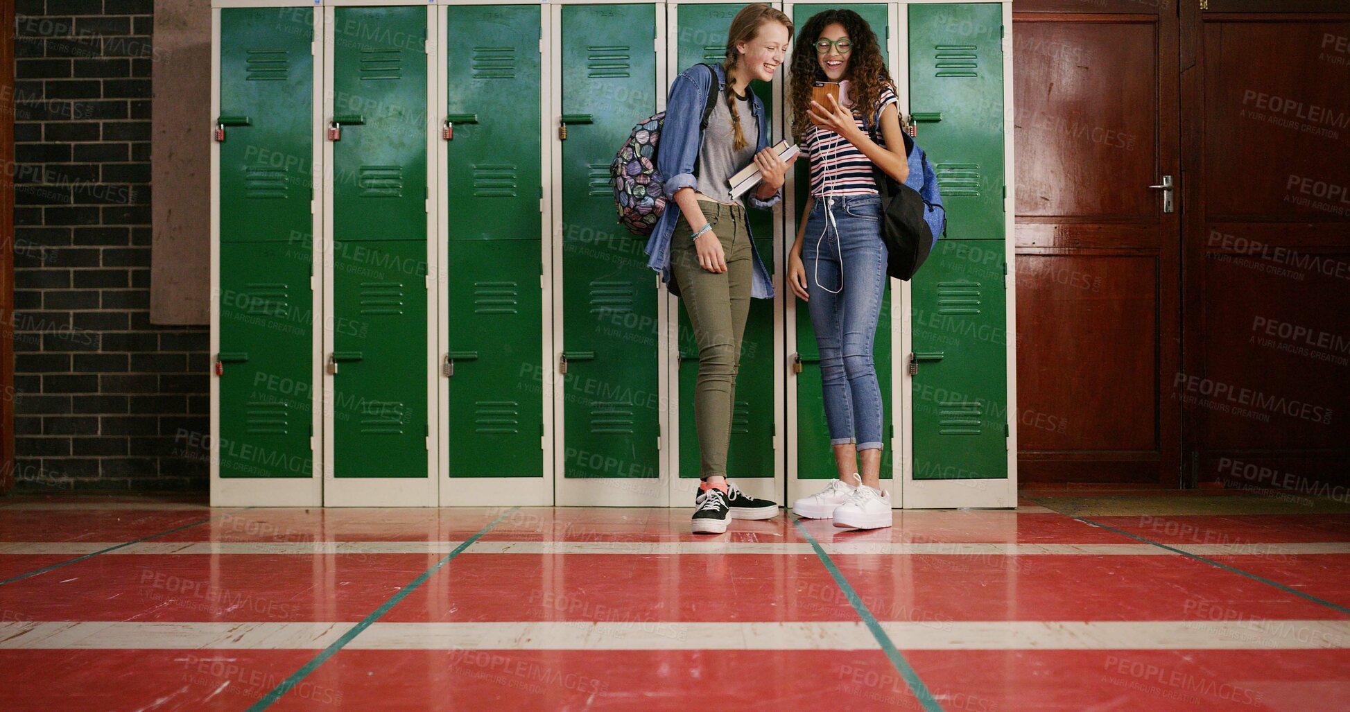 Buy stock photo High school, phone and friends laugh for funny meme, education or scholarship in hallway. Mobile, students and teen girls learning with app for joke, game or check test results for assessment online