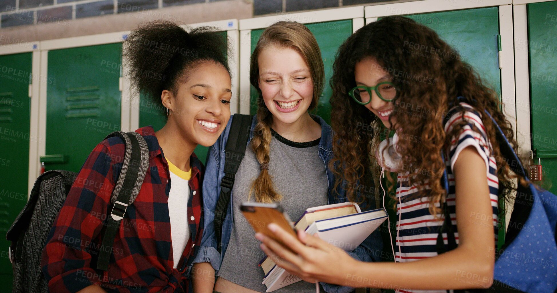 Buy stock photo Students, phone and happy friends in high school for education, course and scholarship. Mobile, group and teen girls learning with app for story, info or check test results for assessment online
