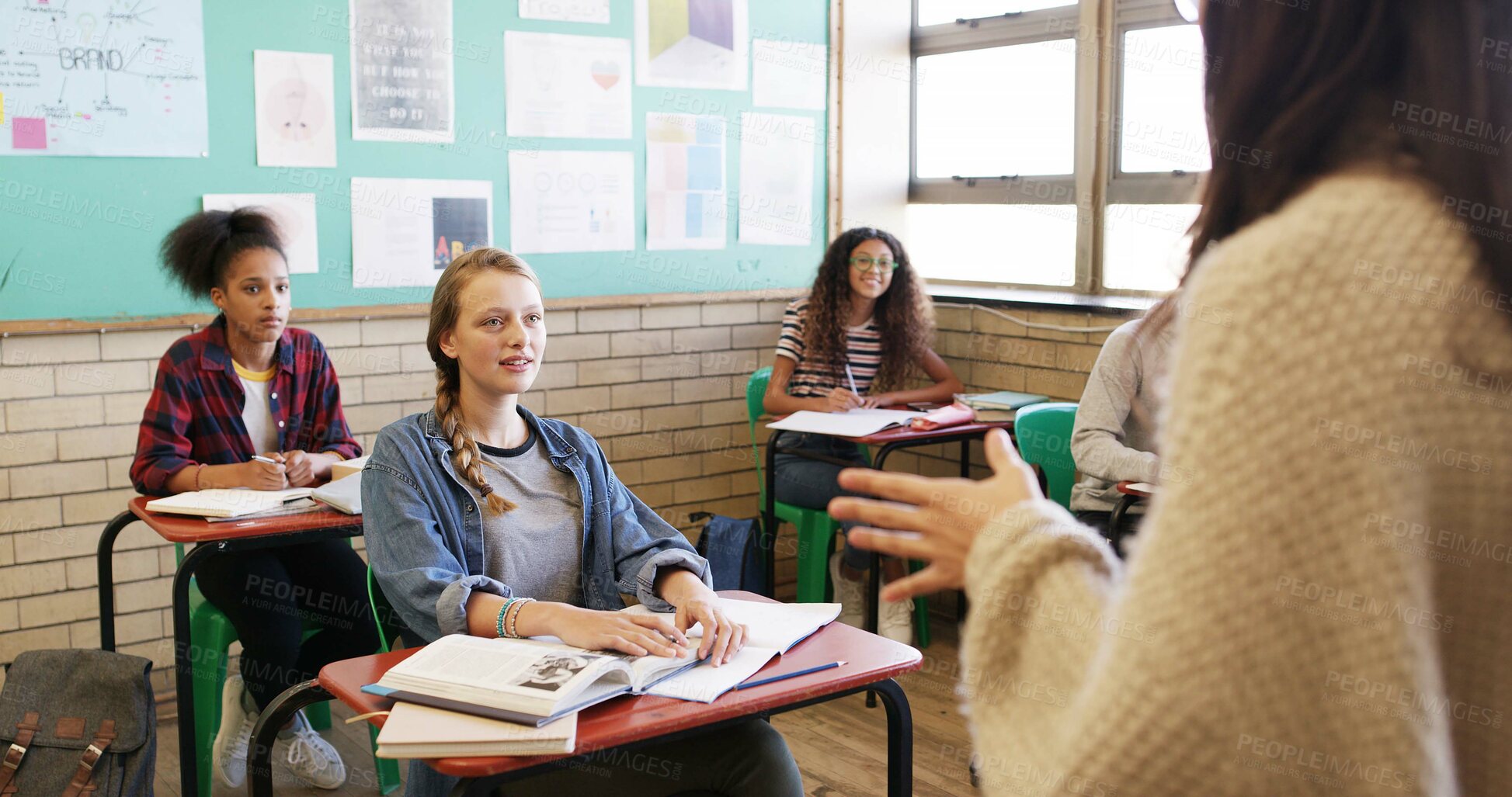 Buy stock photo High school, learning and teacher with students in classroom for curriculum, education and lesson. Academy, teaching and woman with teenagers for discussion, writing notes and listening for knowledge