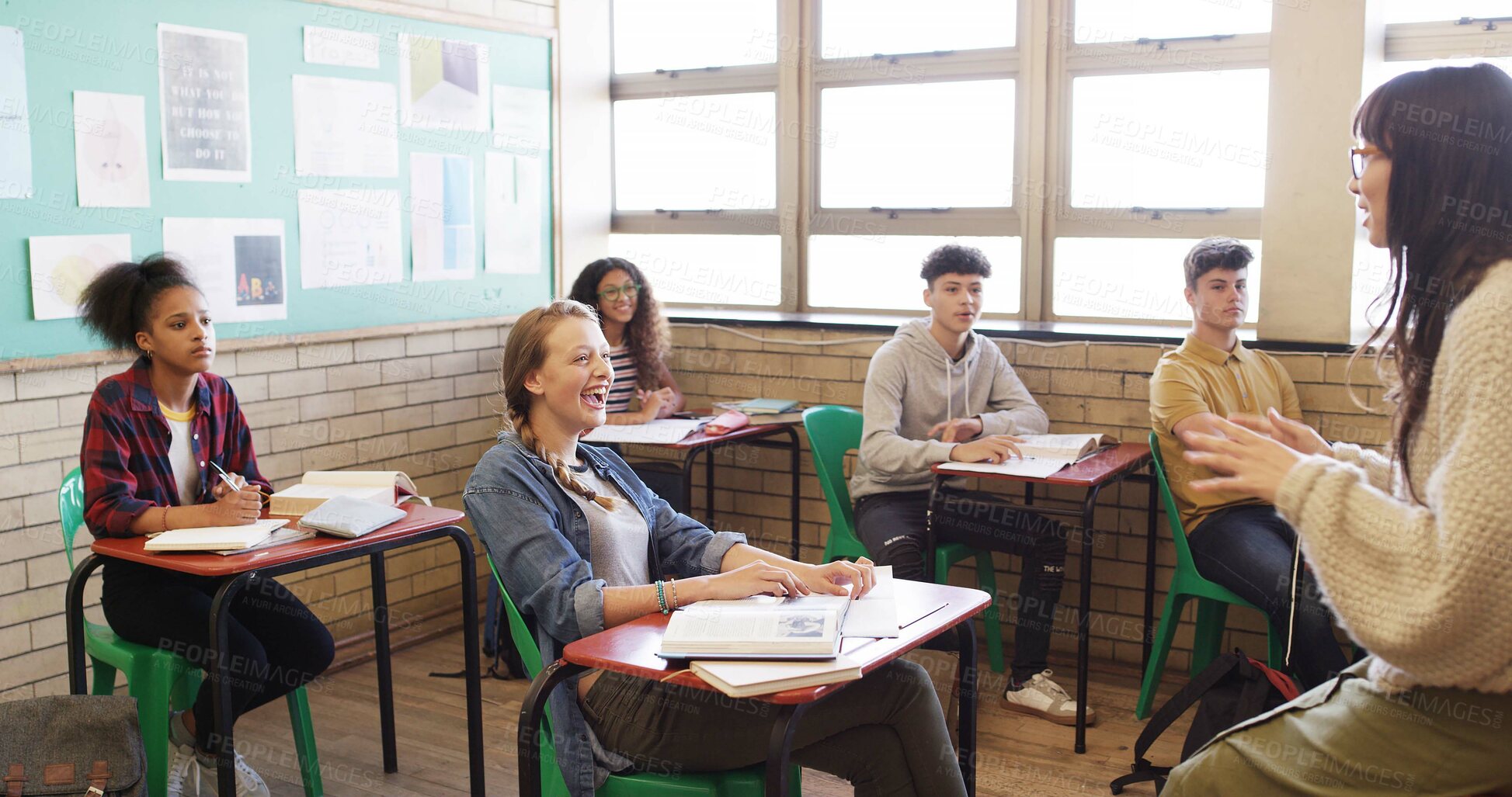 Buy stock photo High school, teacher or happy with students in lesson for learning, study methods or attention. Teenage group, people and tutor with discussion in classroom for education, exam support and teaching