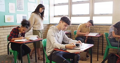 Buy stock photo Test, high school and teacher walking in class for assessment, exam and quiz supervision. Teaching, academy and woman with students writing assignment for education, learning and lesson progress