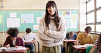 Crossed arms, smile and woman teacher in classroom with confidence for education career. Portrait, knowledge and female educator with pride for job, growth or development at high school or academy.