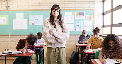 Buy stock photo Crossed arms, portrait and woman educator in classroom with confidence for education career. Smile, knowledge and female teacher with pride for job, growth or development at high school or academy.