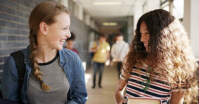 Buy stock photo Laugh, walking and friends at high school in hallway for learning, lesson and education together. Happy, campus and teenagers in conversation, talking and chat in corridor for bonding, relax or break