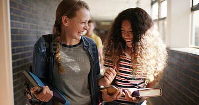 Buy stock photo Friends, walking and girls at high school in hallway for learning, lesson and education together. Happy, campus and teenagers in conversation, talking and chat in corridor for bonding, relax or break