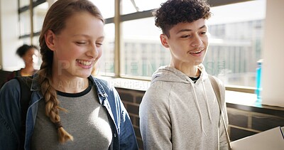 Buy stock photo Boy, girl and laugh in hallway at high school with books, development and chat on walk to class. Friends, teenager and happy for education, conversation or listen to funny story with joke at academy