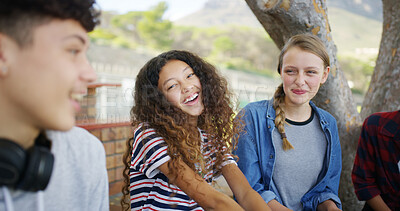 Buy stock photo High school, happy and friends outdoor for talking, conversation and chat together on campus. Academy, teenagers and girls laughing for funny story, gossip and discussion at recess for education