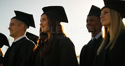 Buy stock photo Graduation, students and group with hats, ceremony and celebration of milestone or academic success. University, achievement and people with robes for event, education and complete studies or course