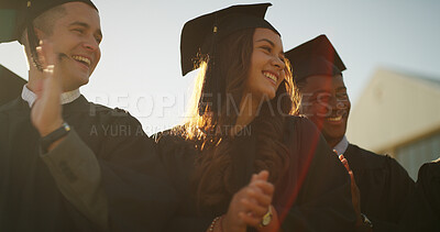 Buy stock photo Achievement, applause and graduation with students outdoor for celebration, milestone or success. Education, excited and scholarship with graduate people clapping on college on university campus