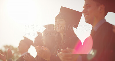 Buy stock photo Woman, students and applause for graduation outdoor for education, lens flare and class success. Happy, people and clapping hands for college achievement, award announcement and certificate ceremony