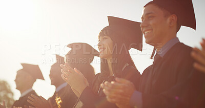 Buy stock photo Clapping, education and graduation with students outdoor for celebration, milestone or success. Achievement, applause and scholarship with graduate people, excited on college on university campus