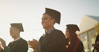 Buy stock photo Graduation, students and applause for success, ceremony and celebration of milestone or achievement. University, knowledge and people with robes for event, education and clapping for finished course