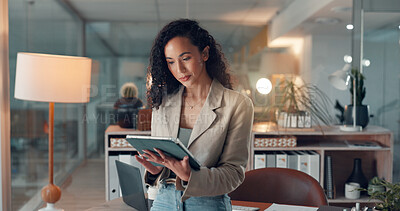Buy stock photo Hands, tablet and reading with business woman in office for planning, magazine editor and night. Media publication, website and article deadline with person in creative agency for newsletter draft