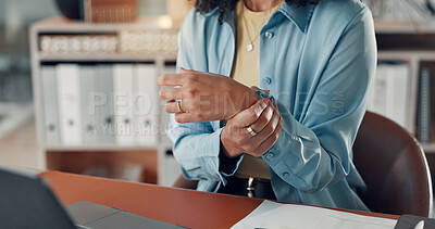 Buy stock photo Business woman, wrist pain and laptop with tension for sprain, pressure or injury in office. Hands, person and document with technology for burnout, deadline or fatigue for compliance officer