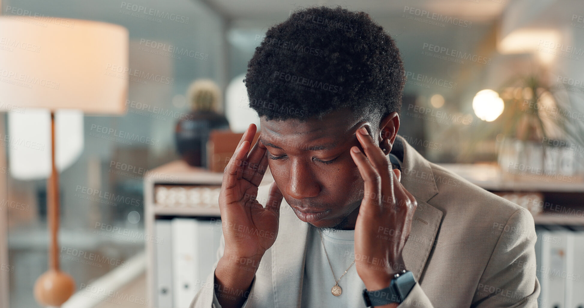 Buy stock photo Business, night and black man with headache, tension or financial agency with pain, exhausted or fatigue. Evening, person and employee in office, migraine or massage temple with pressure or stress