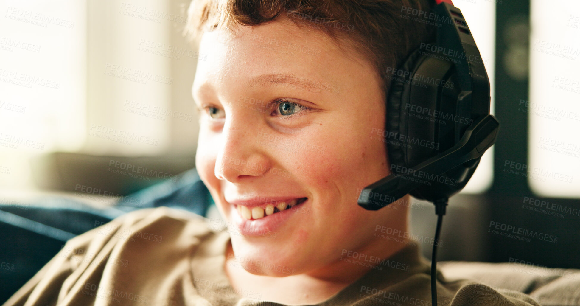 Buy stock photo Headphones, house and boy with smile, video game and competition with esports, relax and playing. Entertainment, headset and happy child on couch, contest and hobby with fun, winning and subscription