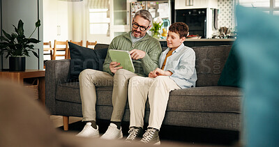 Buy stock photo House, father and boy on sofa, tablet and social media with online game, relax and entertainment. Apartment, family and dad on couch, son or parent with tech, bonding together and website info