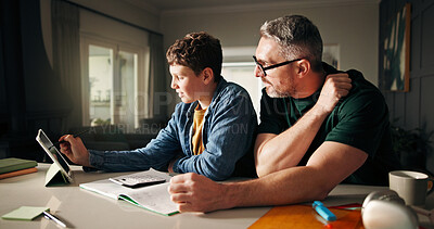 Buy stock photo Tablet, homework and help with father and son in kitchen for learning app, education or teaching. Growth, online school schedule and support with man and kid in family home for reading and math tutor