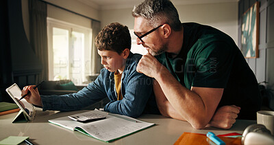 Buy stock photo Tablet, homework and teaching with father and son in kitchen for learning app, education or help. Growth, online school schedule and support with man and kid in family home for reading and math tutor