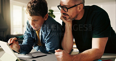 Buy stock photo Tablet, homework and reading with father and son in kitchen for learning app, education or teaching. Growth, online school schedule and support with man and kid in family home for help and math tutor