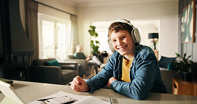 Buy stock photo Homework, tablet and boy with headphones, portrait and elearning with audio, calculator and maths. Happy child, education and knowledge with online course, notes and studying with sound and smile
