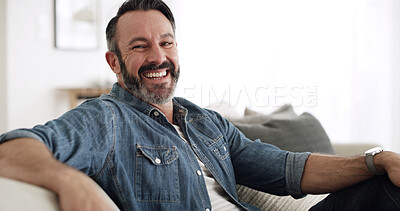 Buy stock photo Happy, man and relax with portrait at house for peace, start day and comfortable of weekend break. Mature male person, laugh and chilling on couch for free time, cozy morning and unwind of wellness