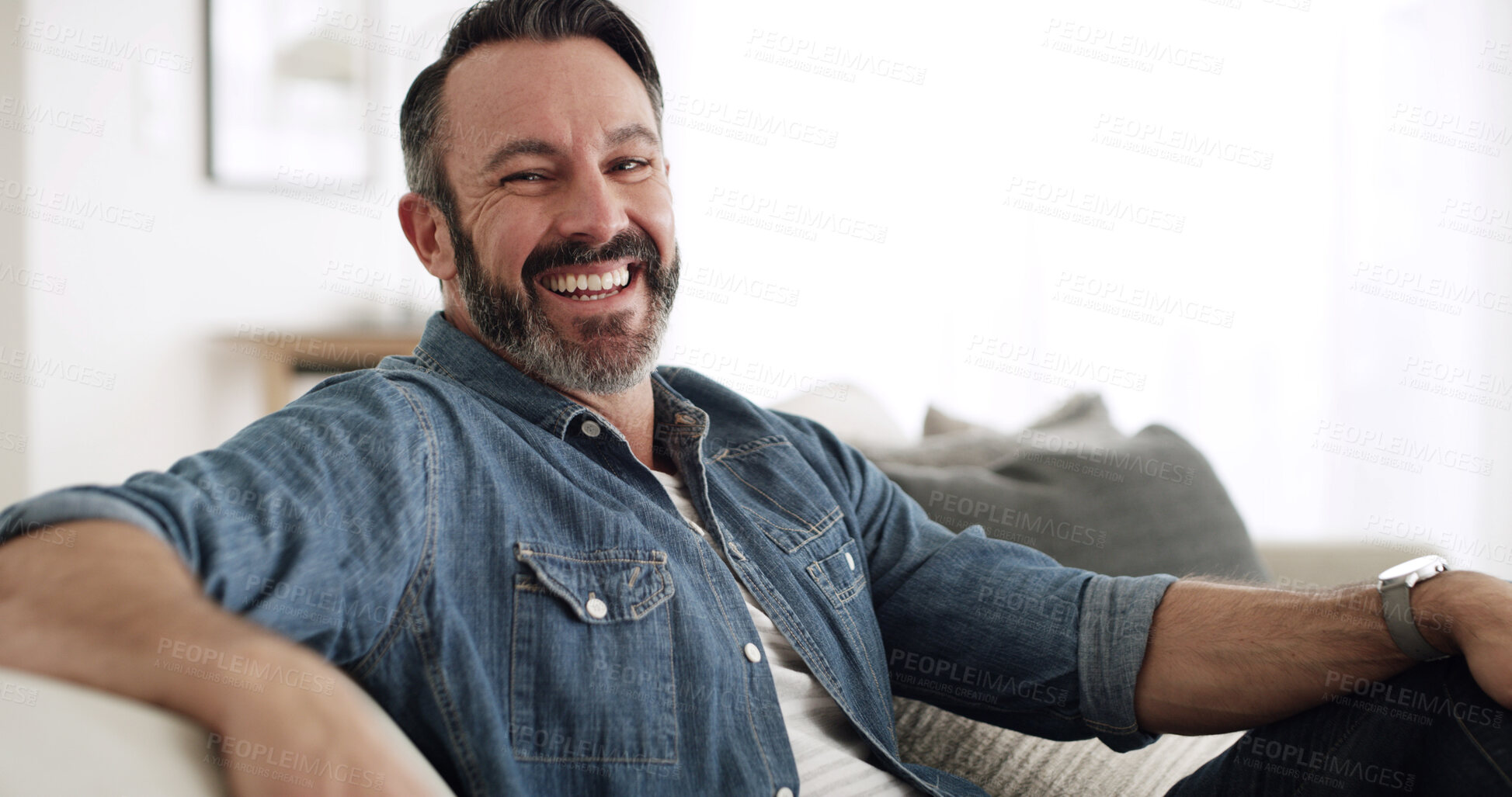 Buy stock photo Happy, man and relax with portrait at house for peace, start day and comfortable of weekend break. Mature male person, laugh and chilling on couch for free time, cozy morning and unwind of wellness