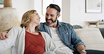Bonding, hug and smile with couple on sofa in living room of home together for break, relax or wellness. Happy, moment and relationship with mature people embracing in apartment for affection or love