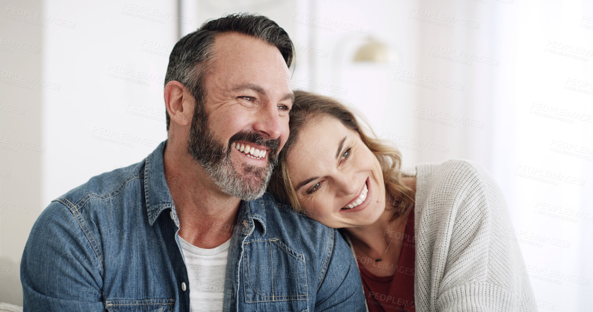 Buy stock photo Happy, hug and mature couple in home with love, marriage and care together for bonding. Smile, connection and woman embracing man for support, relationship or romance in living room at house.